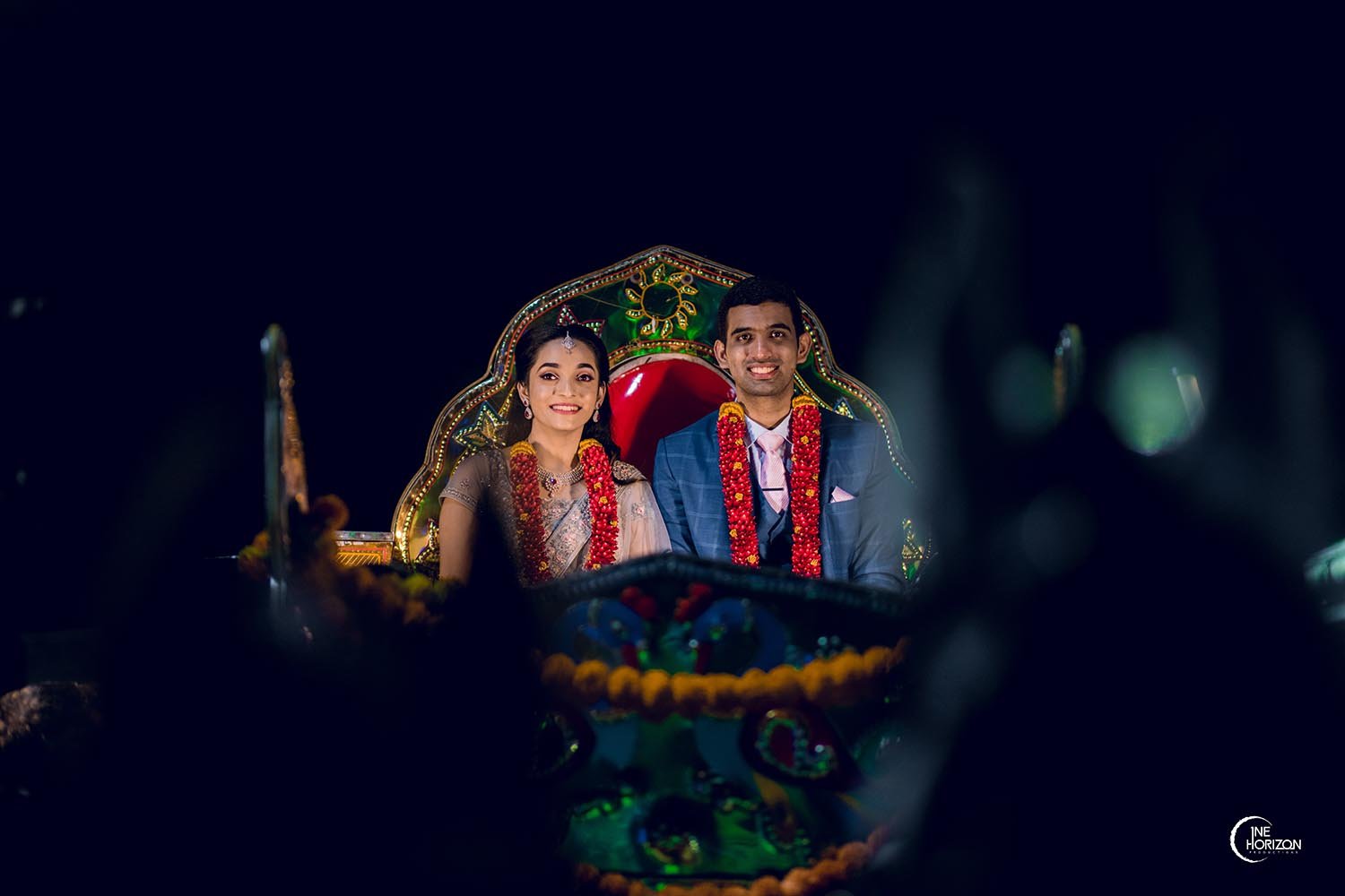 Bride and groom seated on the chariot to make a grand entry