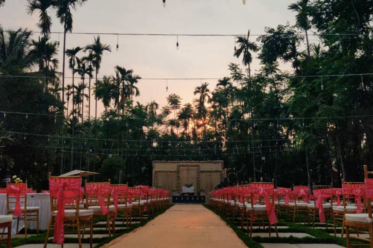 Seating arrangements at an outdoor wedding venue in Bangalore