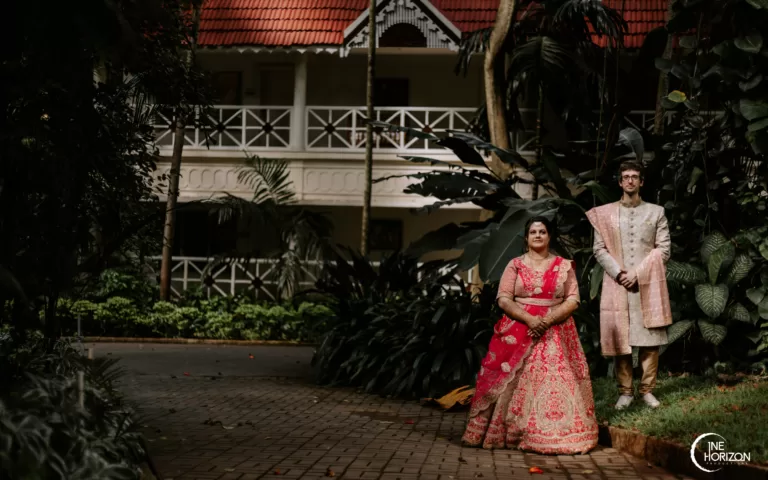 Indian bride posing with her light pink and golden lehenga. | Photo 269222